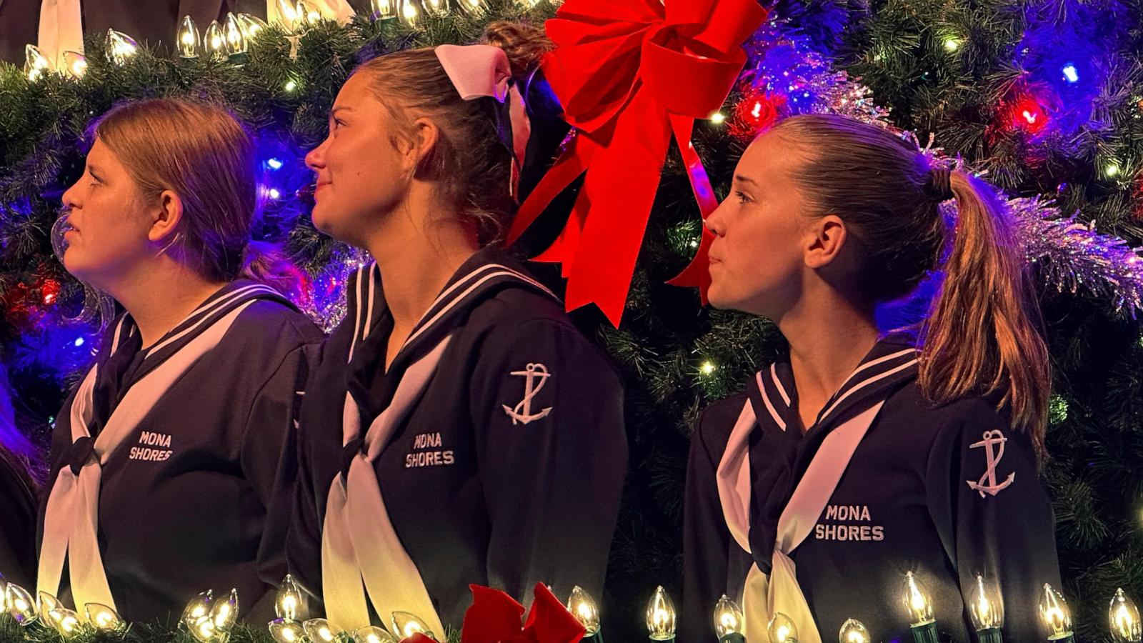 Michigan high school choir belts out holiday tunes from towering Christmas tree