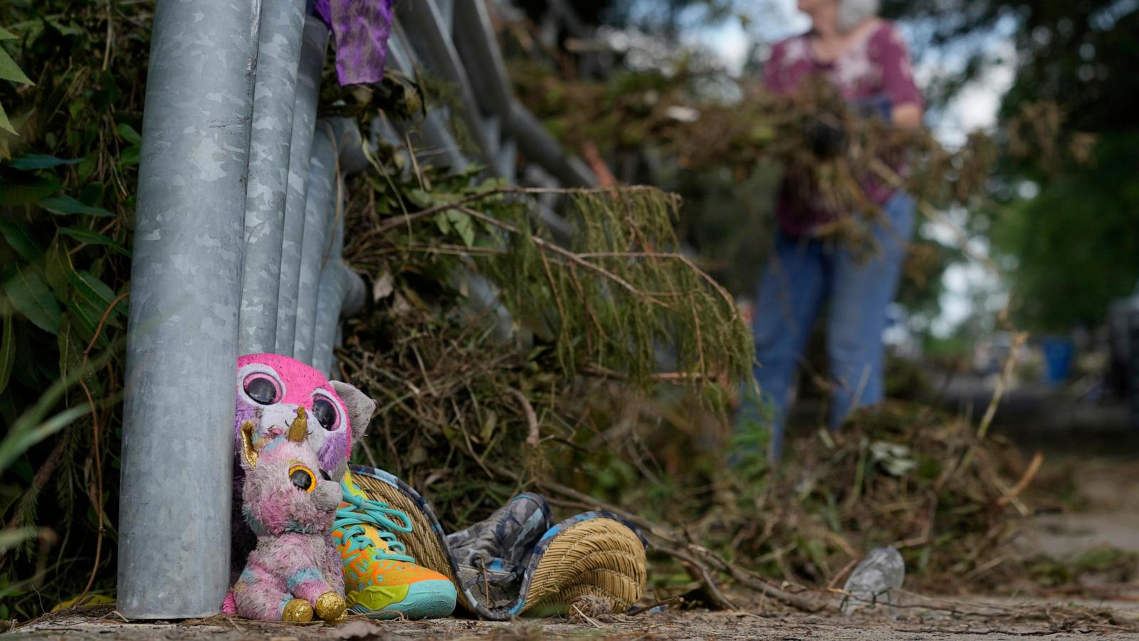 Searchers in helicopters and on horseback scour Texas flood debris for the missing