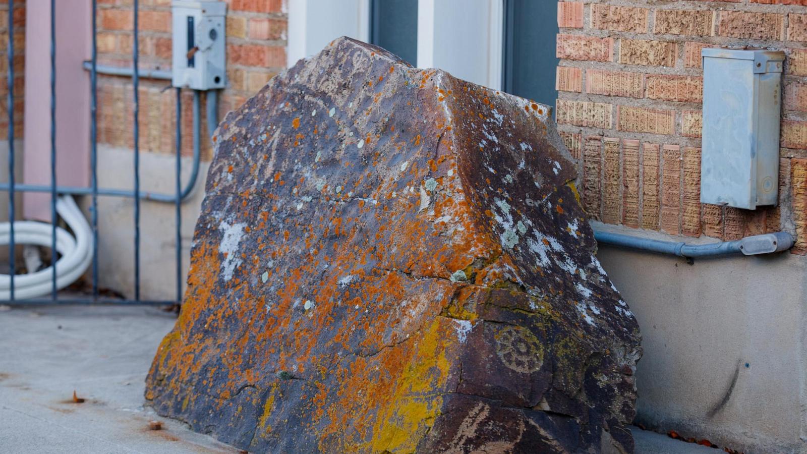 Church repatriates sacred rock covered with petroglyphs after 14-year effort