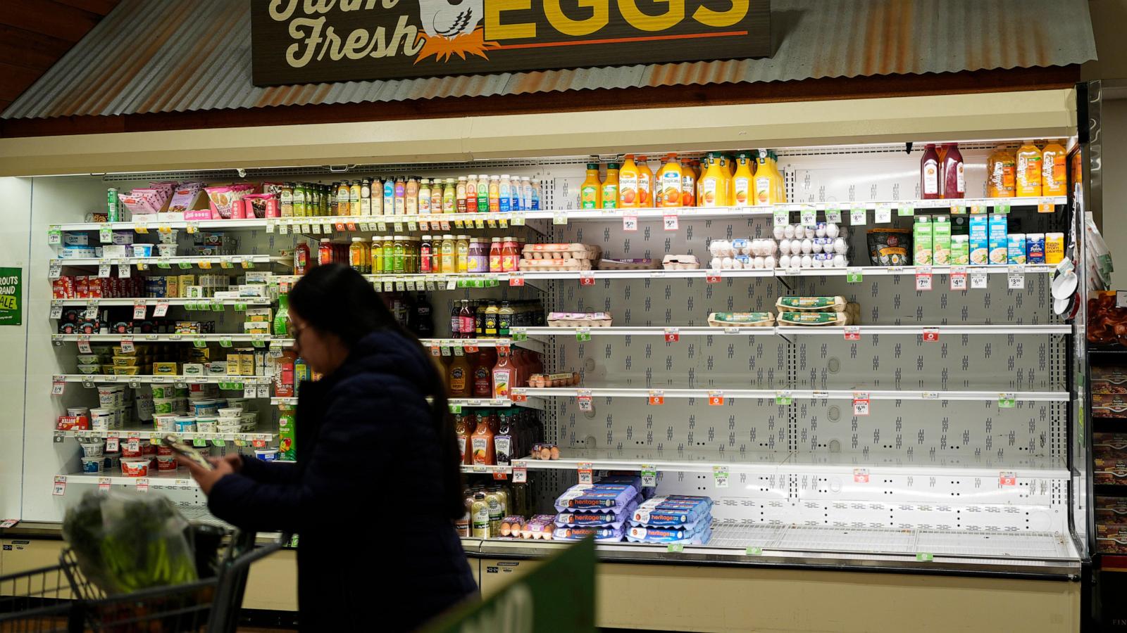 Crews spread salt on roads and people stock up on batteries as a winter storm threatens the US