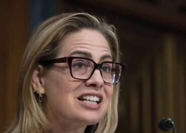 Sinema admits a romance with her security guard as she fights ex-wife’s lawsuit