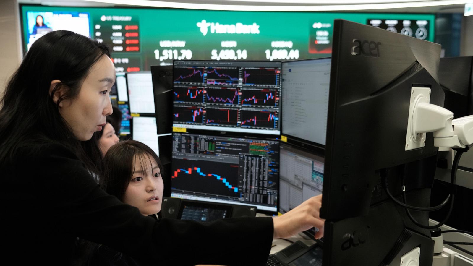 Asian shares mostly gain while oil prices keep rising