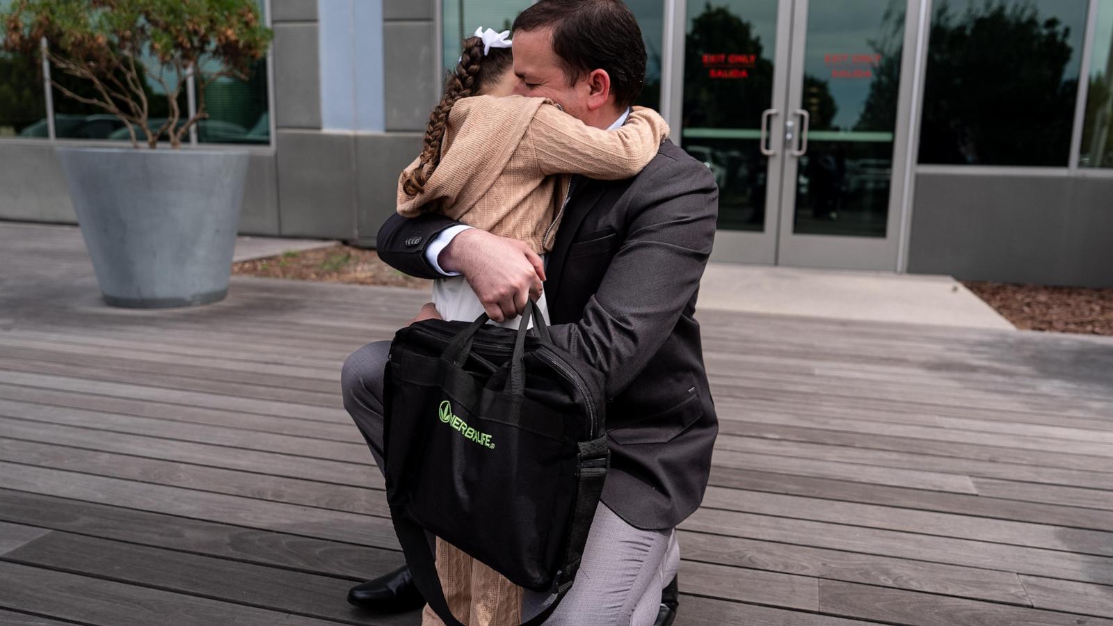 A Venezuelan doctor in ICE custody misses husband's asylum interview after being detained at airport