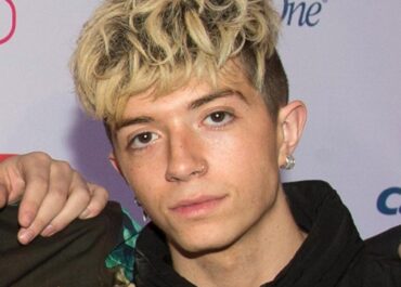 Ex-girlfriend of boy band member charged with trying to hire a hitman to kill him