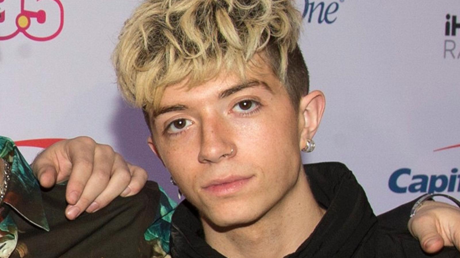 Ex-girlfriend of boy band member charged with trying to hire a hitman to kill him