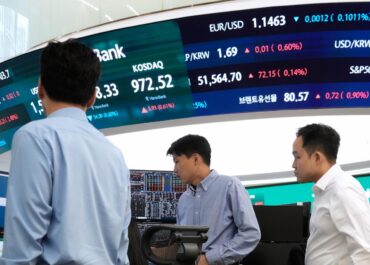 Asian shares are mixed and US futures fall as Iran talks make progress