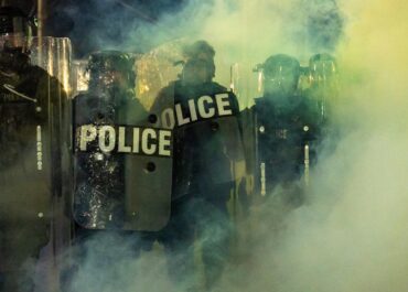 New Jersey police sergeant charged with stealing journalist’s camera bag at immigration protest