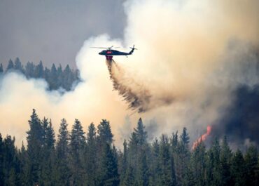 Oregon firefighters brace for windy and hot weather as they battle dozens of blazes