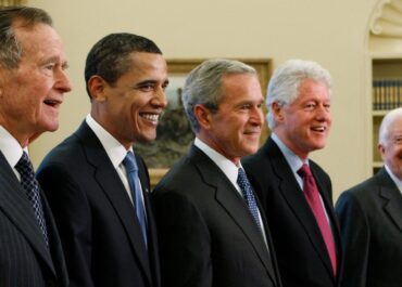Trump goes unmentioned but not ignored as Clinton, Bush and Obama step up as essayists on presidents