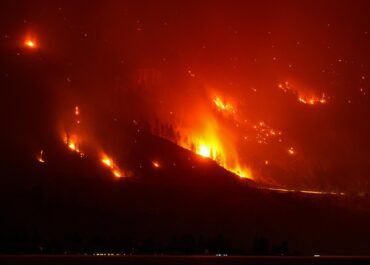 Wildfires burn across western US and Canada as residents are evacuated