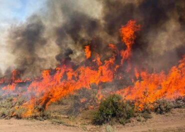 Dangerous wildfire keeps crews from reaching helicopter crash in Utah