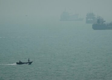 An Iranian commercial ship is struck near Strait of Hormuz with 1 dead, Iranian media say