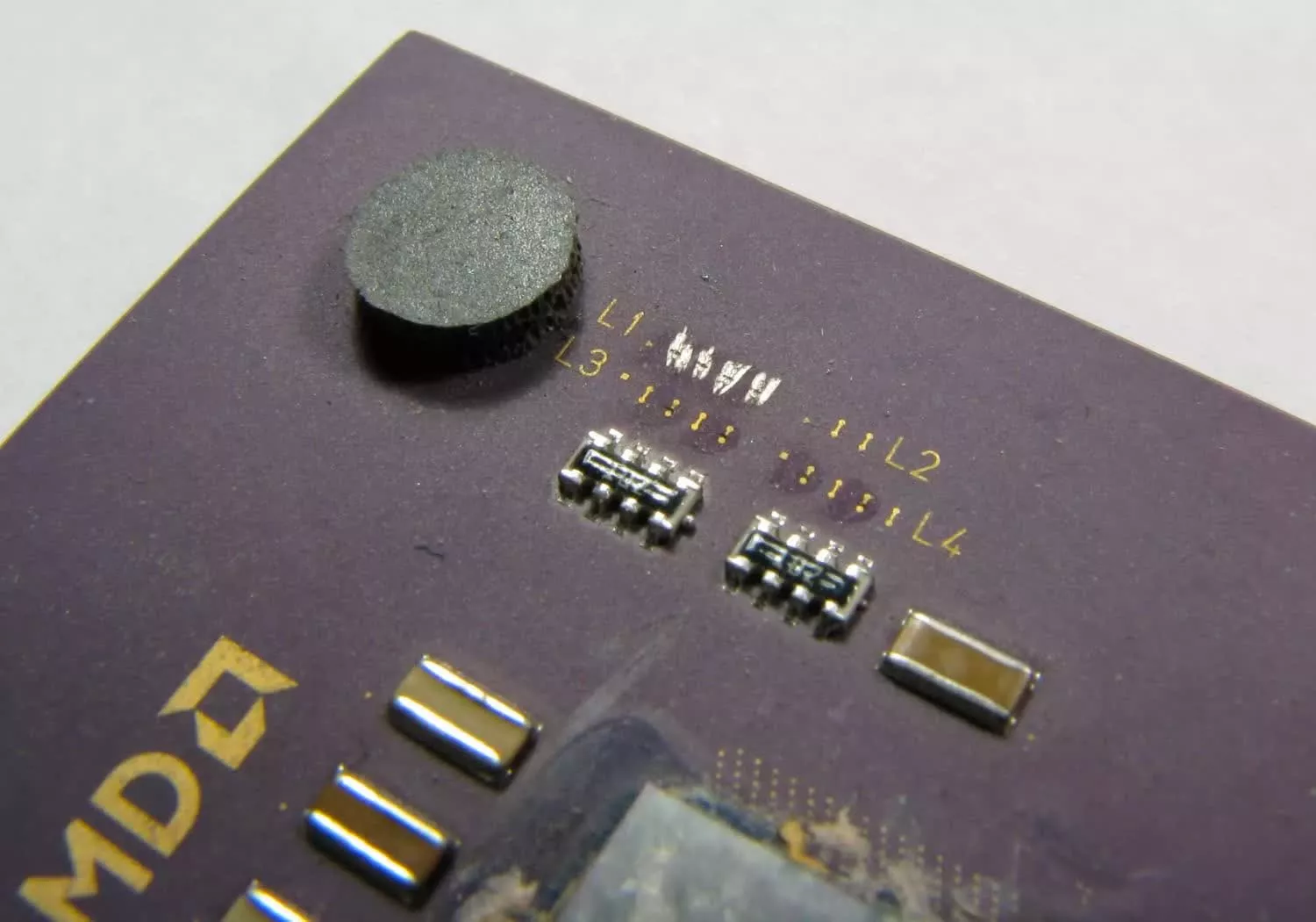 Which AMD CPUs were famously unlocked for overclocking using the "pencil trick"?