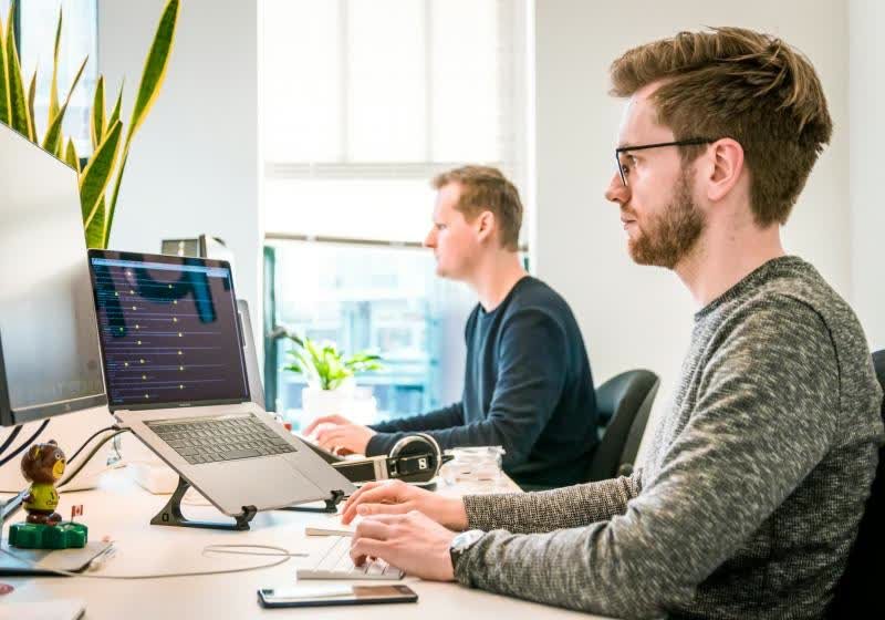Workers are now pretending to use AI to impress their bosses, survey says
