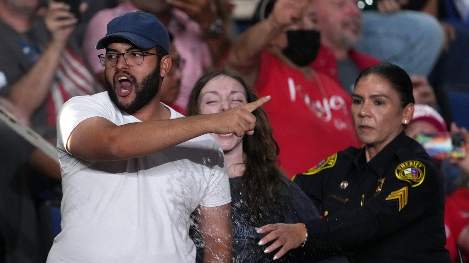 Trump interrupted by protesters as he fights to rally Texas voters behind Paxton in US Senate race
